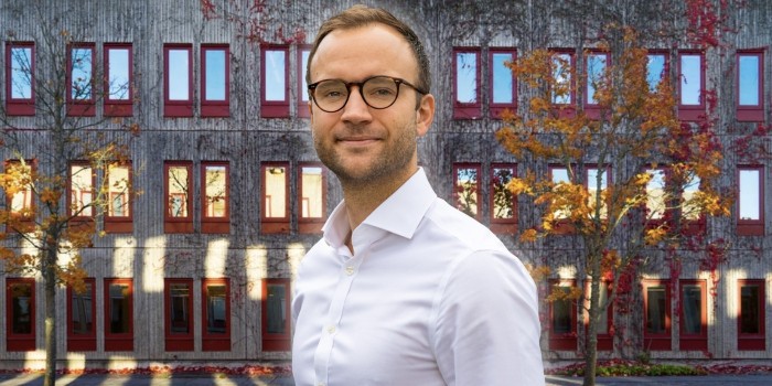 Carl-Emil Lindholm in front of one of the acquired properties in Stockholm. The image is a montage.