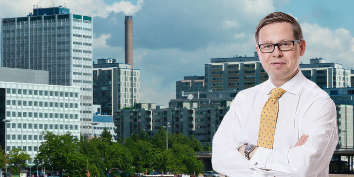 Montage of Ilkka Tomperi, Investment Director and Head of Real Estate at Varma, and Helsinki skyline.