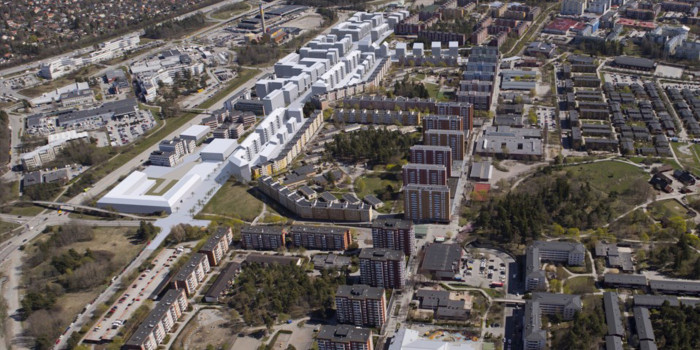 The location of the land description is the empty grass area at the bottom left of this aerial view of Akalla, with the remaining parts of the construction along Finlandsgatan illustrated in white.